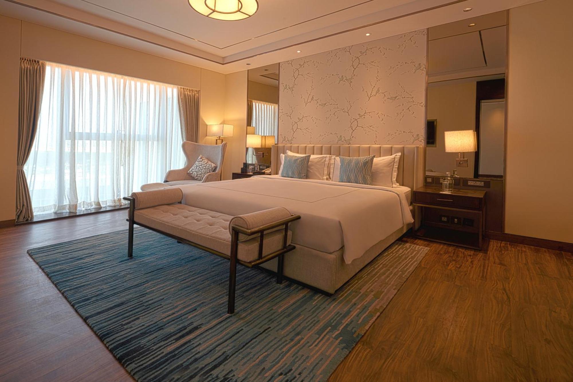 Taj Bangalore Devanahalli Екстер'єр фото A bedroom at the hotel