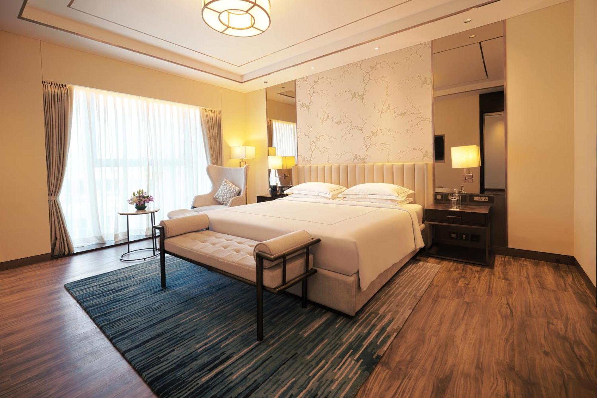 Taj Bangalore Devanahalli Екстер'єр фото A bedroom at the hotel