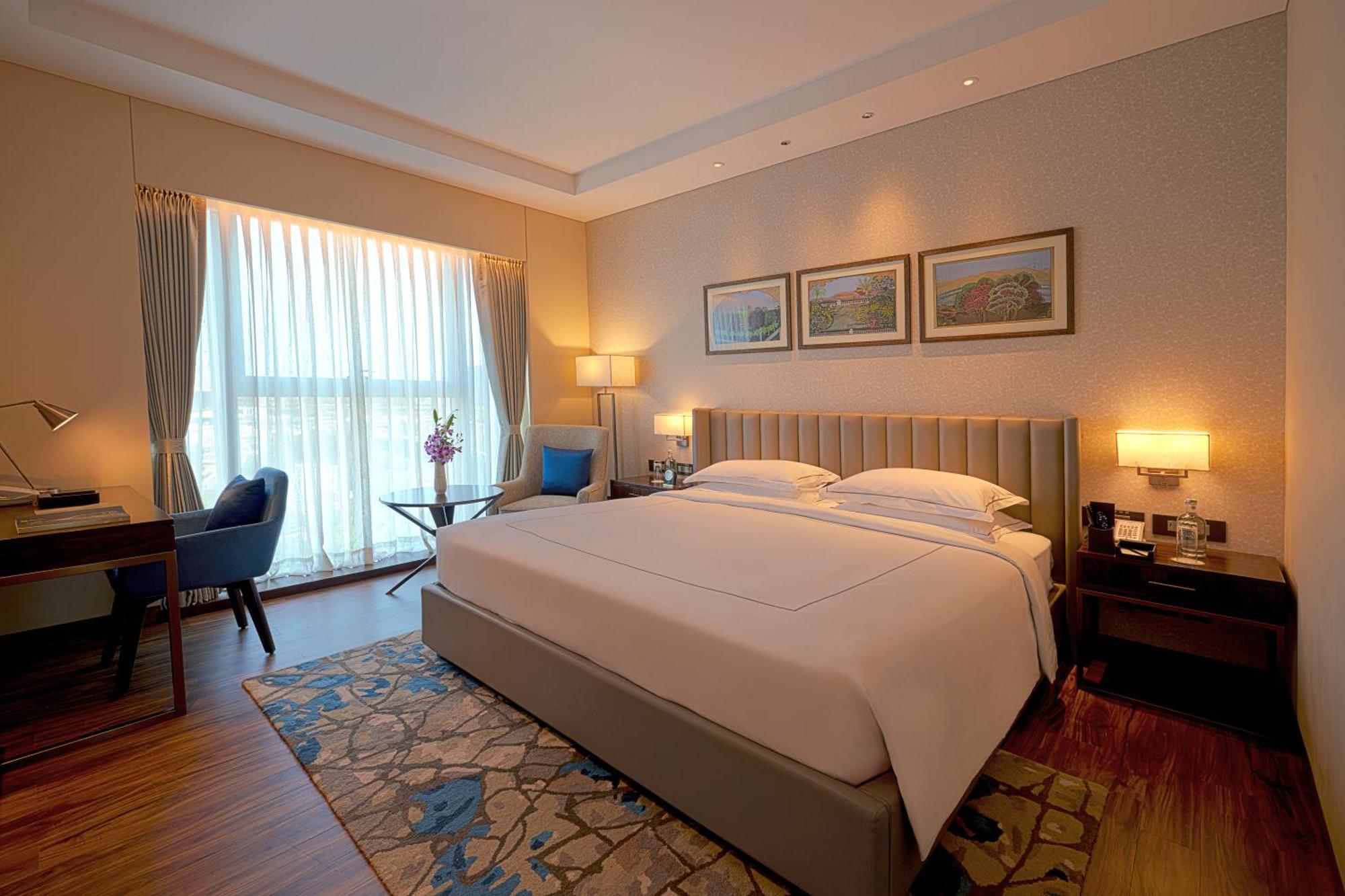 Taj Bangalore Devanahalli Екстер'єр фото A bedroom at the Taj Bengal